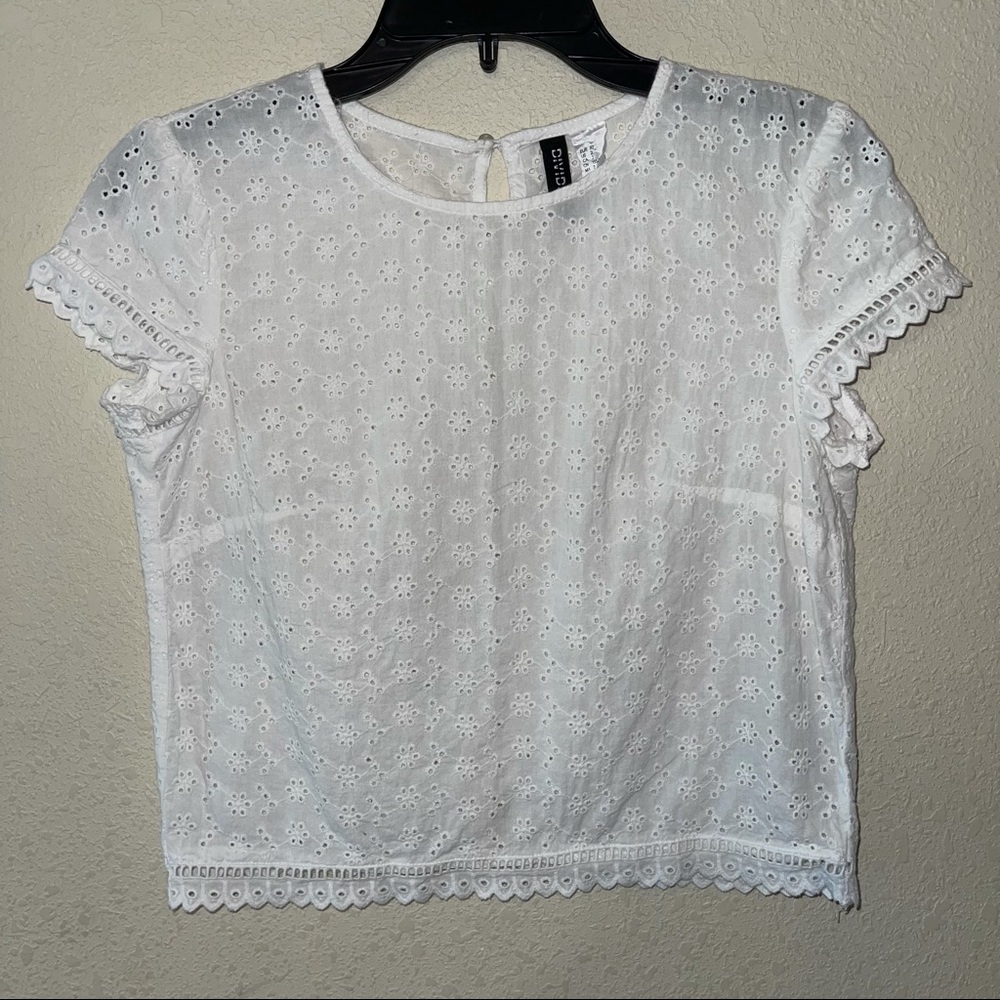 H&M white top with buttons on back
